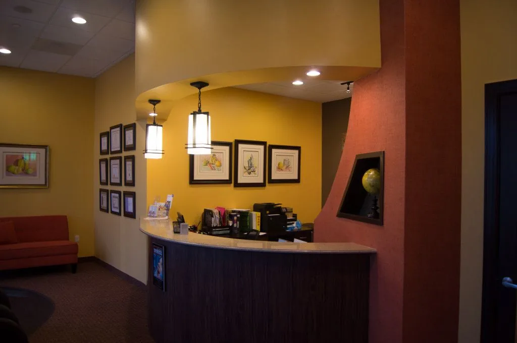 Office hallway with stacked-stone accent walls