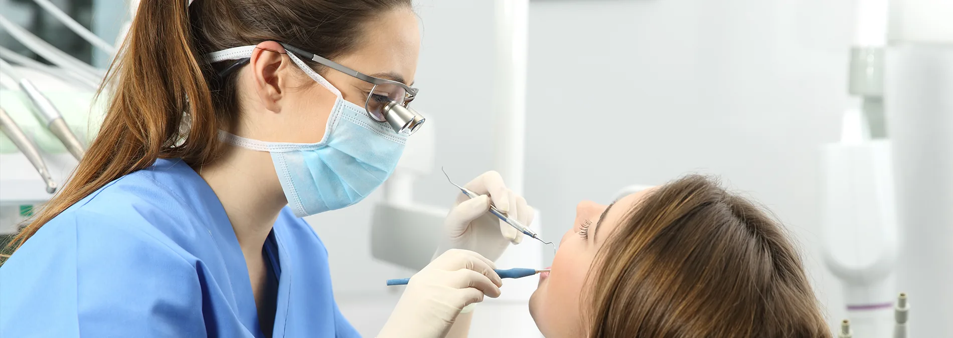 Dental hygienist providing gentle preventive care